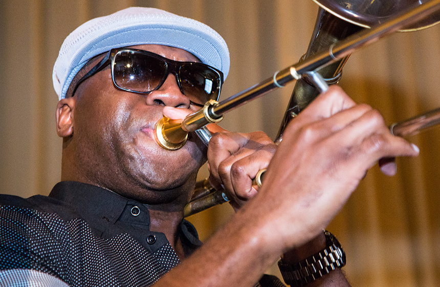 Photo of Big Sam's Funky Nation setting the tone for an Assembly rich with local sounds.