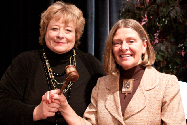 NASAA President Suzi Surkamer (right) passed the NASAA board gavel to Montana Arts Council Executive Director Arni FishbaughfYi Photography by Jamie Dunbar